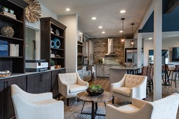 Relaxing resident lounge with coffee bar & fireplace